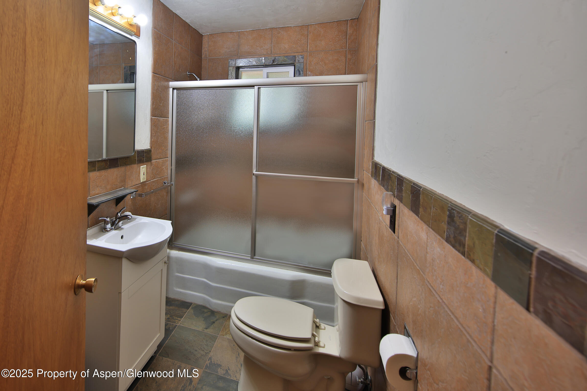 9681 54 7/10 Road Molina, CO 81646 - Photo 13 of 39 a bathroom with a sink toilet and shower