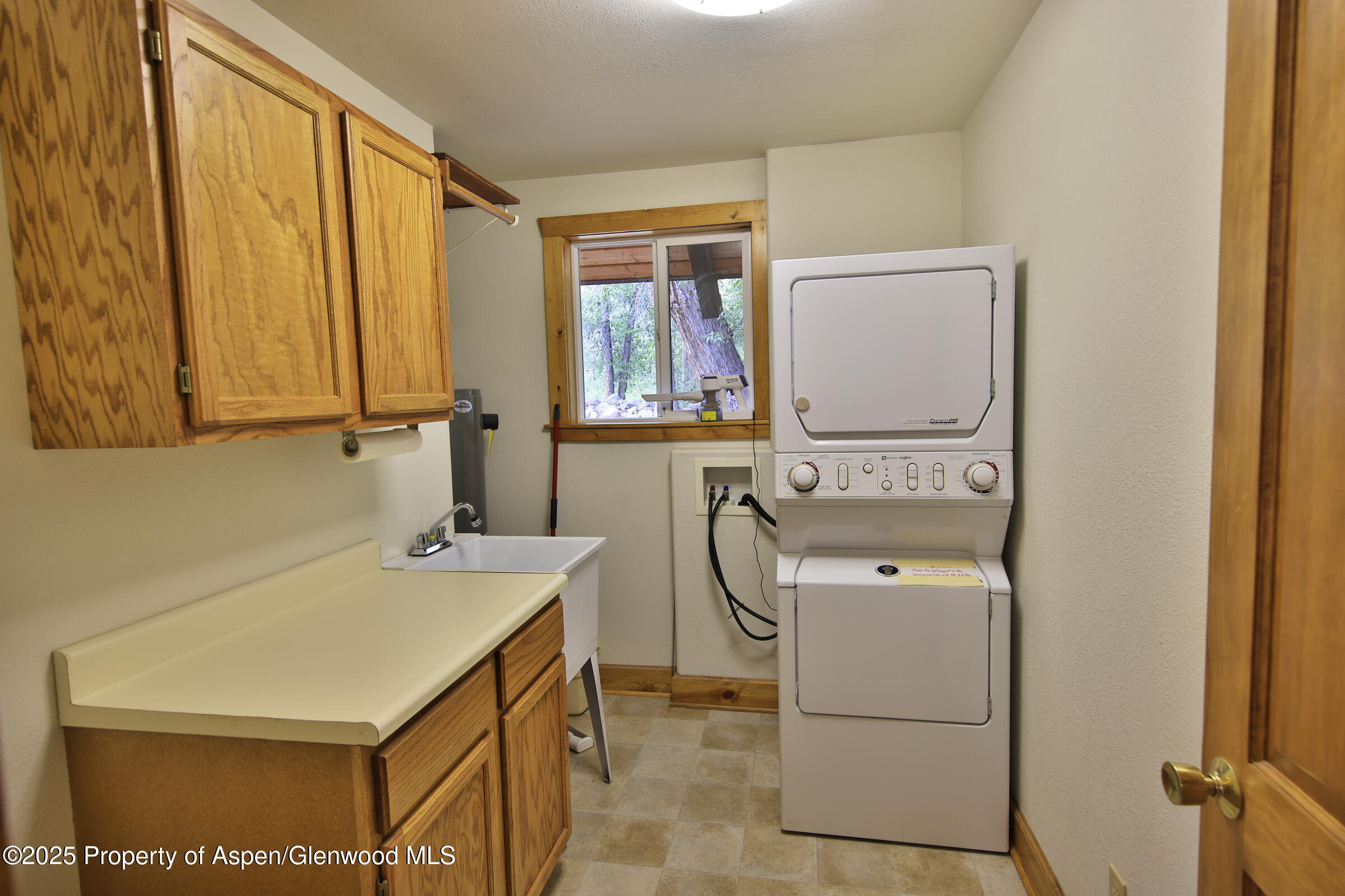 9681 54 7/10 Road Molina, CO 81646 - Photo 16 of 39 a utility room with dryer and washer