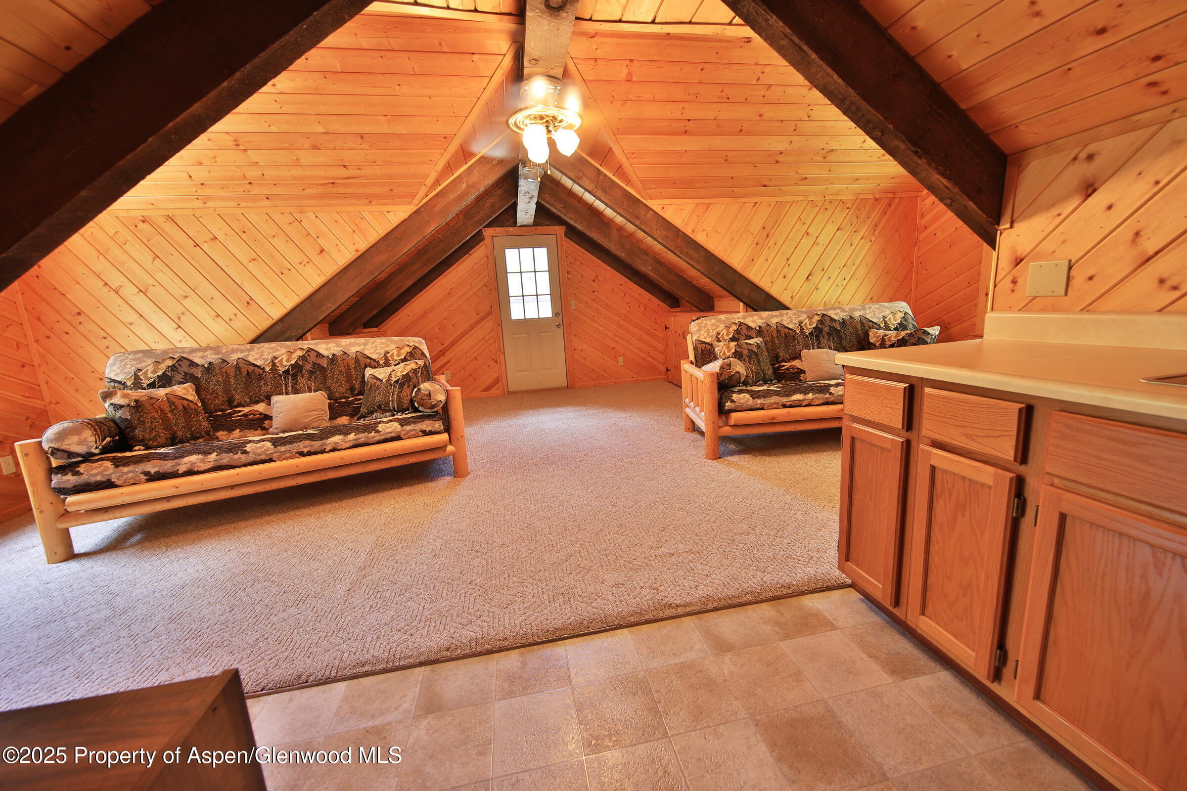 9681 54 7/10 Road Molina, CO 81646 - Photo 21 of 39 a backyard of a house with seating space