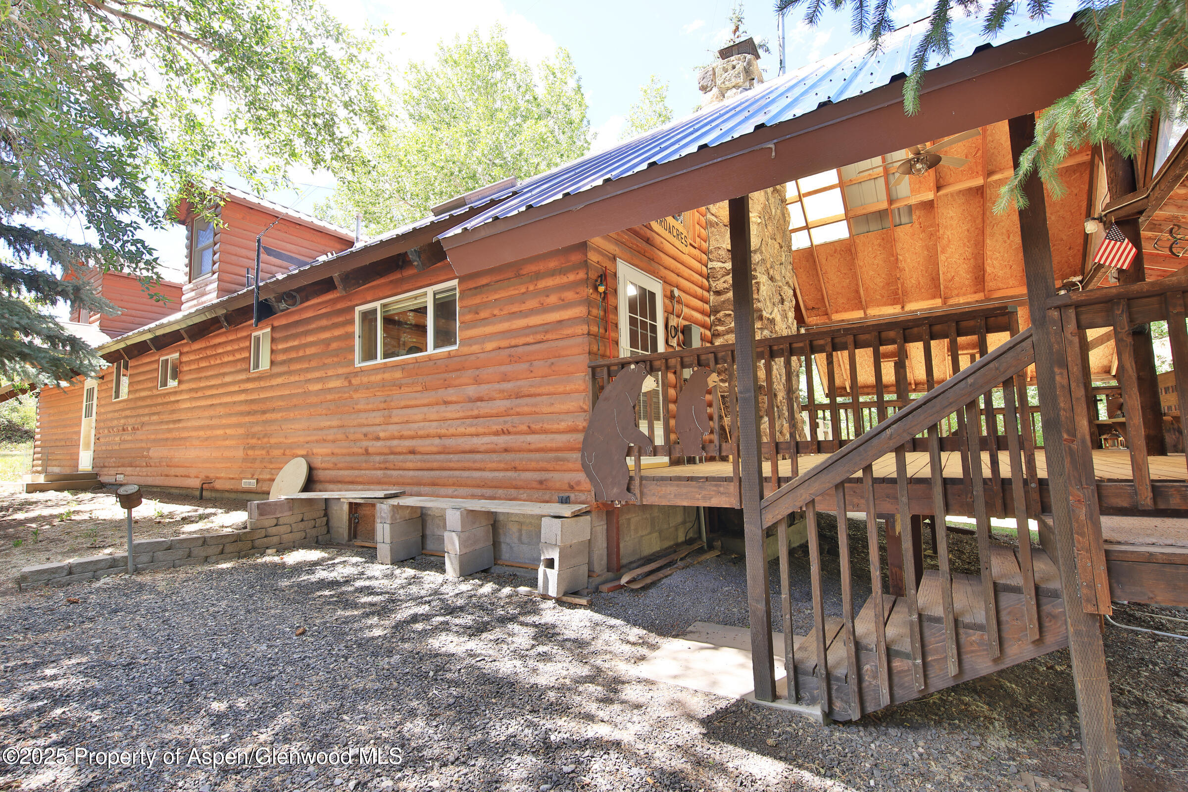9681 54 7/10 Road Molina, CO 81646 - Photo 26 of 39 a view of a house with a yard