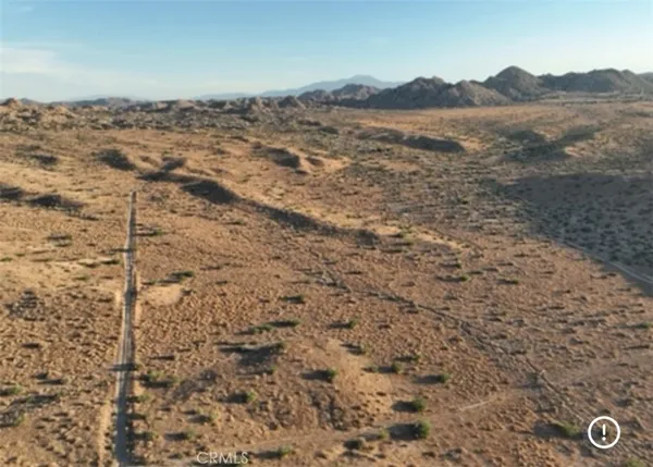 a view of a mountain with an outdoor space
