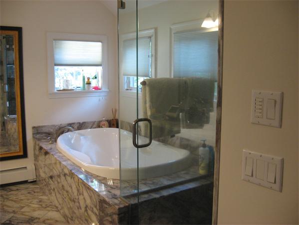 11 Princeton Road Wellesley, MA 02482 - Photo 14 of 22 a bath room with a sink and a mirror