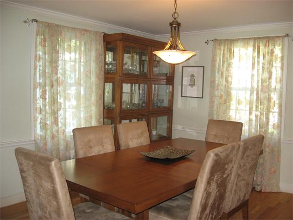 11 Princeton Road Wellesley, MA 02482 - Photo 3 of 22 a view of a dining room with furniture wooden floor and chandelier