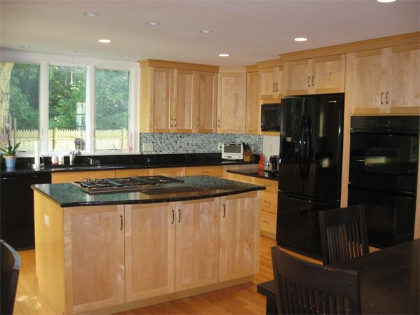 11 Princeton Road Wellesley, MA 02482 - Photo 4 of 22 a kitchen with a stove a refrigerator and a sink