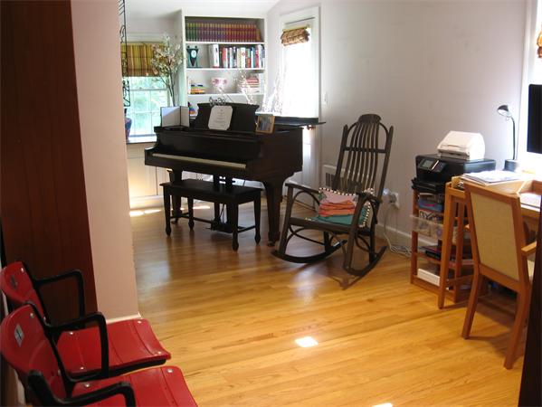 11 Princeton Road Wellesley, MA 02482 - Photo 6 of 22 a living room with furniture and a view of kitchen