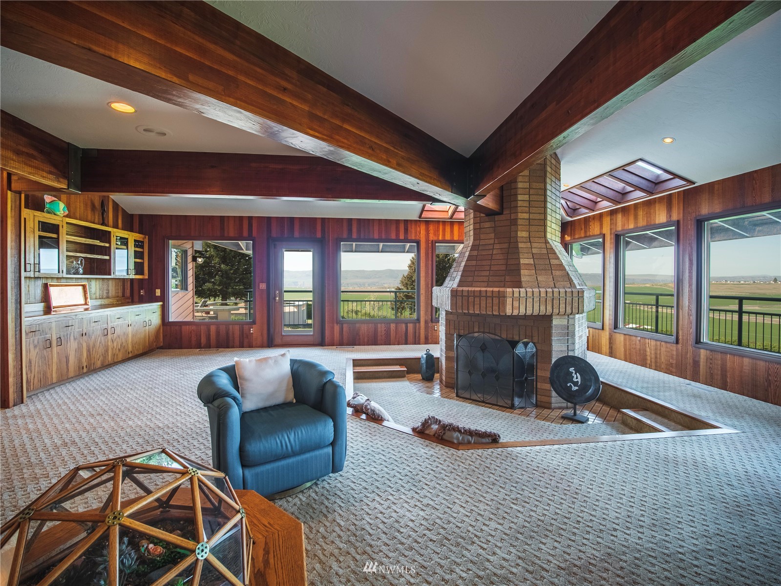 11549 Rd E Southwest Royal City, WA 99357 - Photo 13 of 30 a living room with furniture large windows and a fireplace
