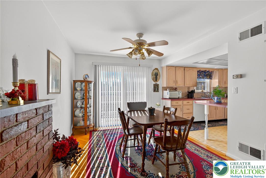 5424 Clauser Road Orefield, PA 18069 - Photo 11 of 31 a view of a dining room with furniture and a chandelier
