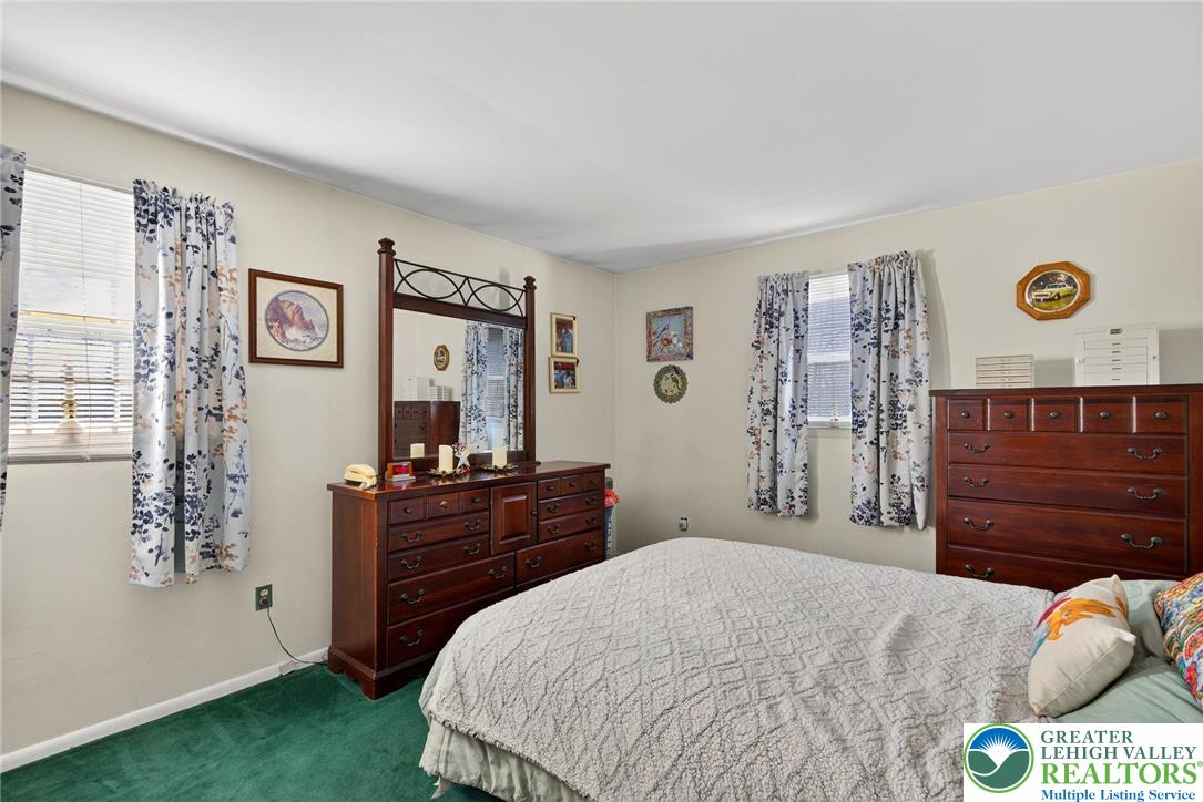 5424 Clauser Road Orefield, PA 18069 - Photo 17 of 31 a bedroom with a bed and a dresser in it