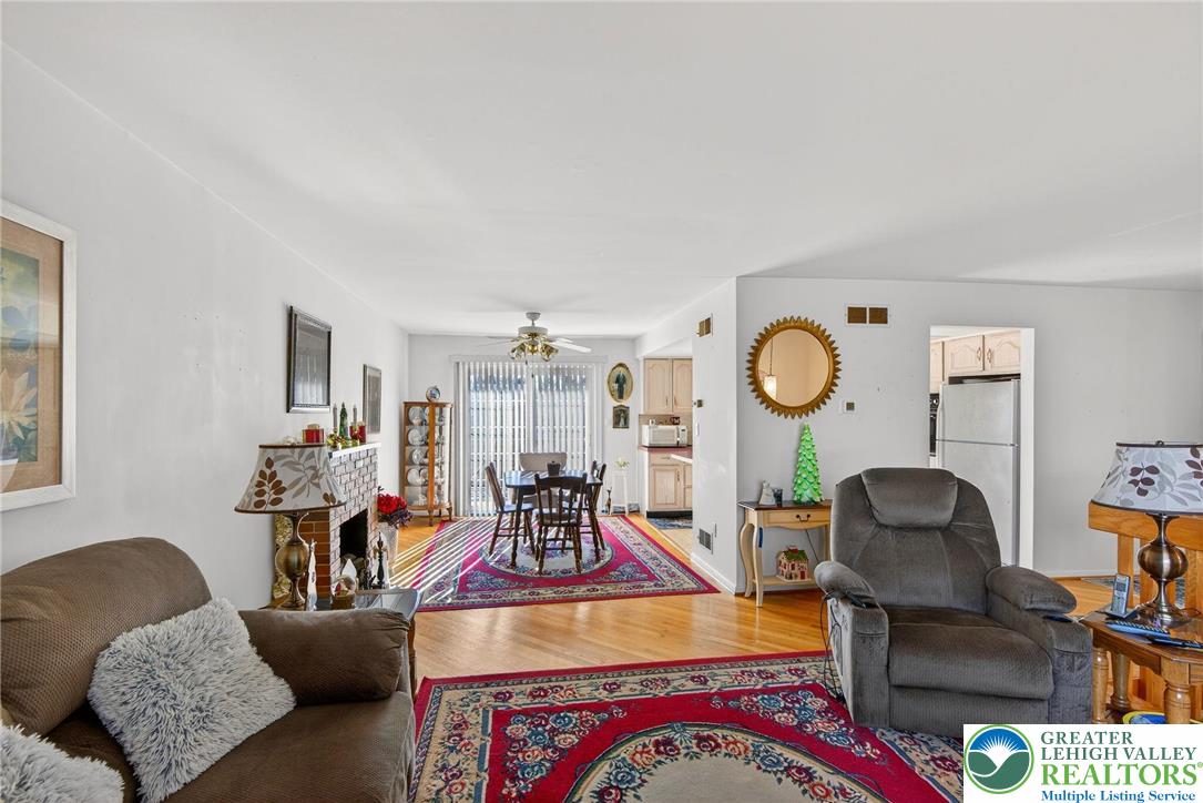 5424 Clauser Road Orefield, PA 18069 - Photo 8 of 31 a living room with furniture and a mirror