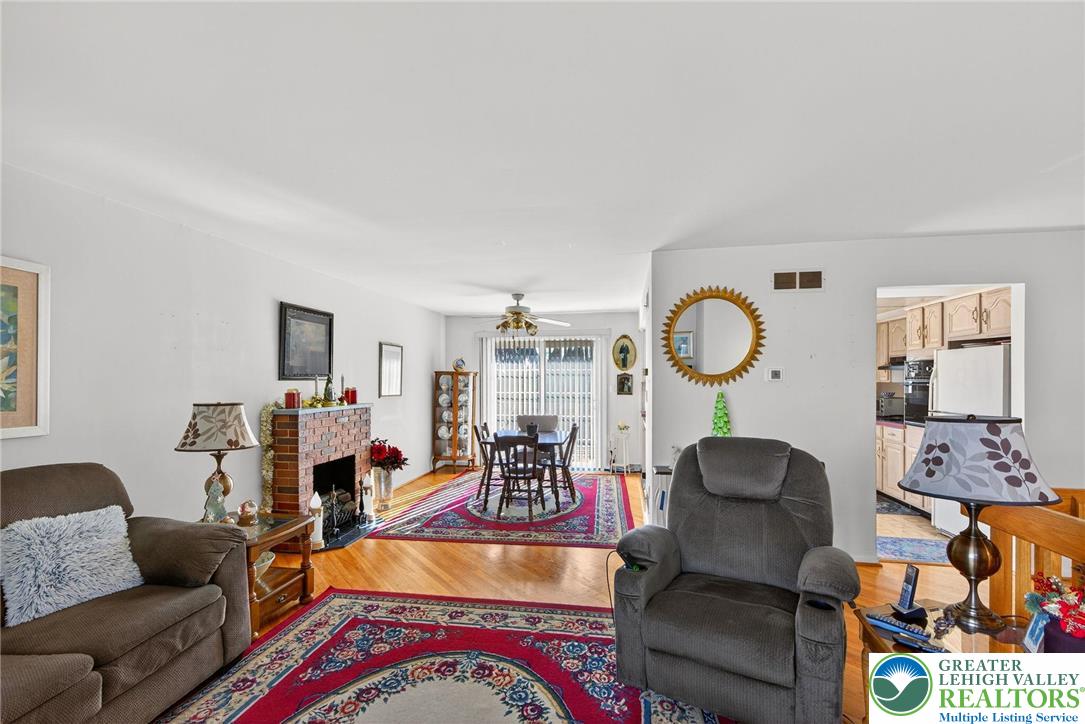 5424 Clauser Road Orefield, PA 18069 - Photo 9 of 31 a living room with furniture a rug and a window