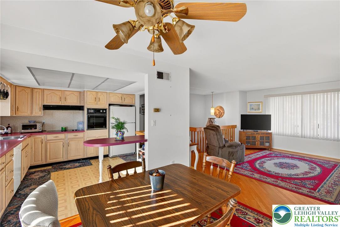 5424 Clauser Road Orefield, PA 18069 - Photo 10 of 31 a living room with furniture and flat screen tv