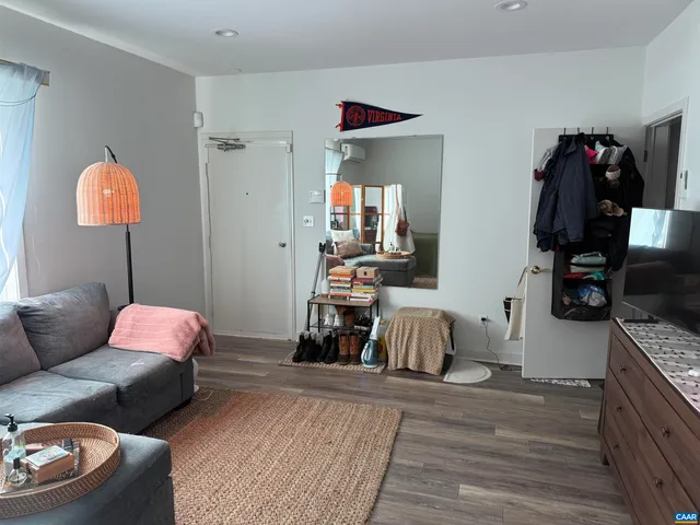 a bedroom with furniture and a bed