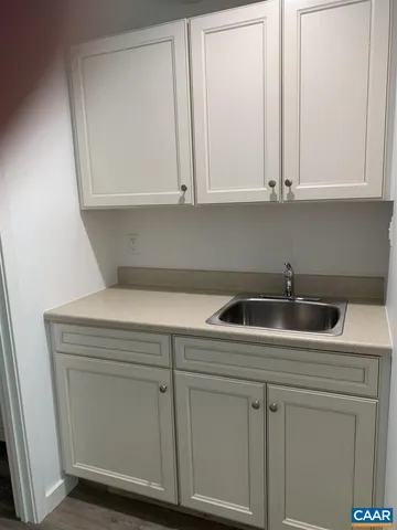 a utility room with a sink