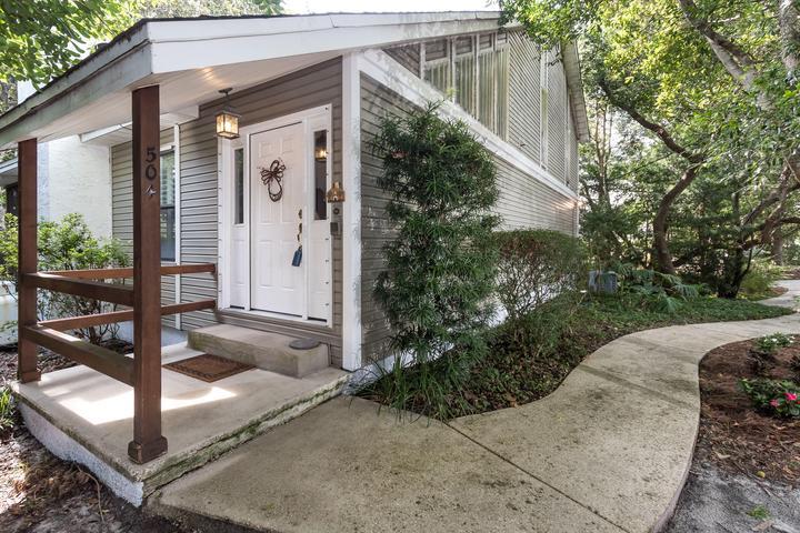 504 Main Street Destin, FL 32541 - Photo 1 of 25 a view of a small house with backyard