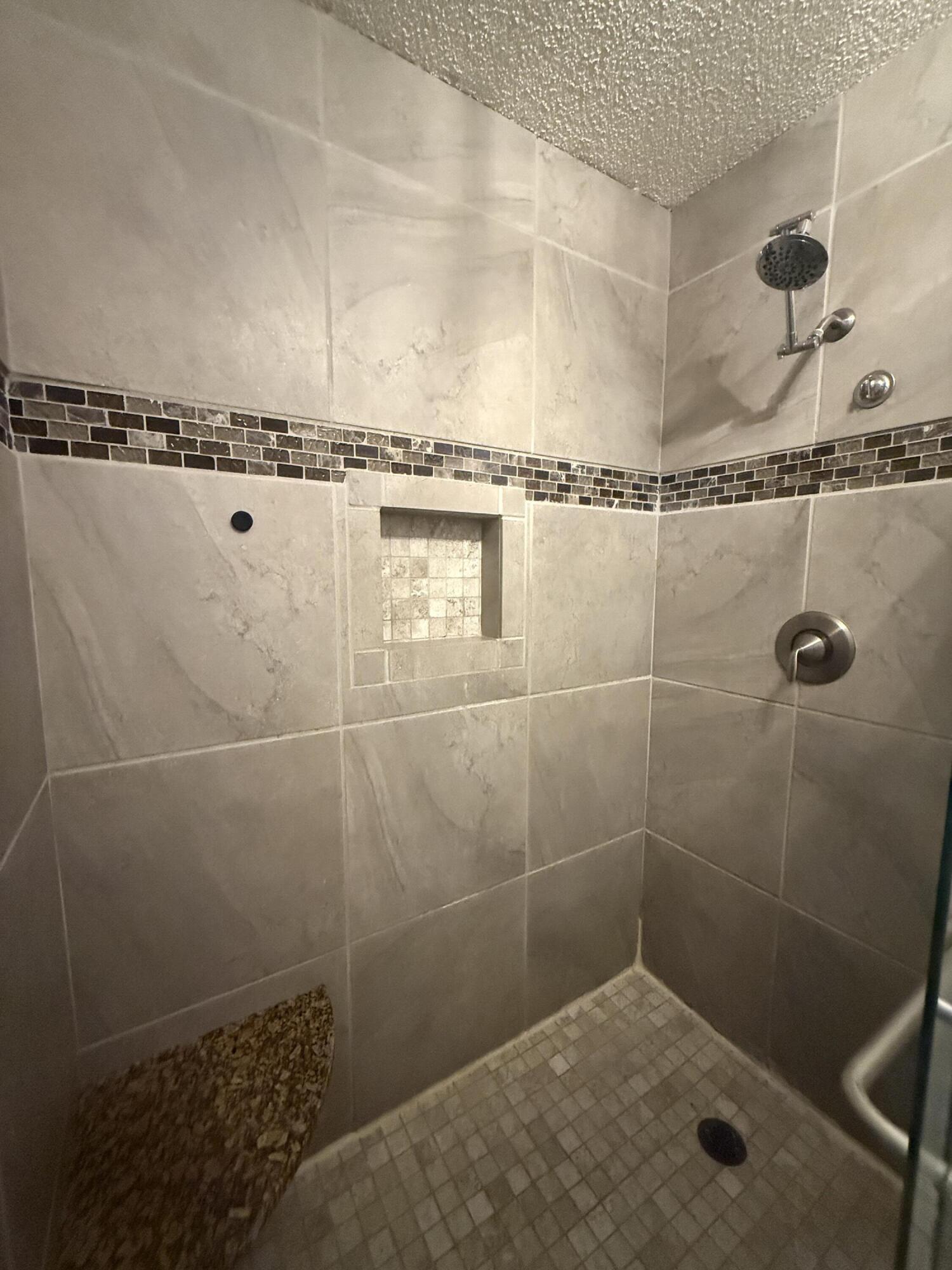 504 Main Street Destin, FL 32541 - Photo 20 of 25 a bathroom with a shower