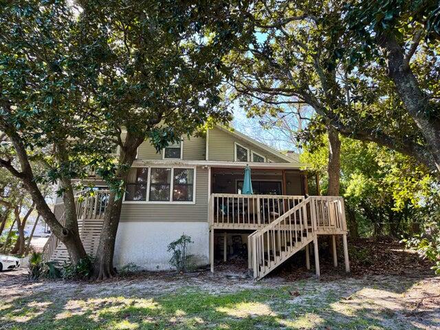 504 Main Street Destin, FL 32541 - Photo 2 of 25 a view of a house with a yard and deck
