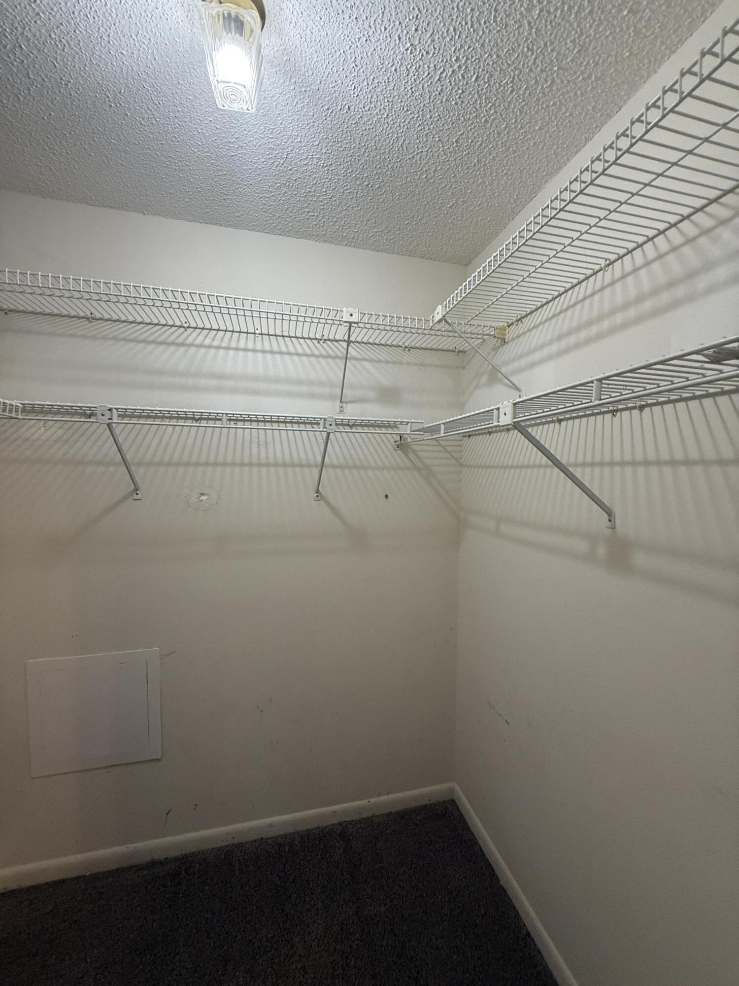504 Main Street Destin, FL 32541 - Photo 23 of 25 a view of a room with racks on the wall