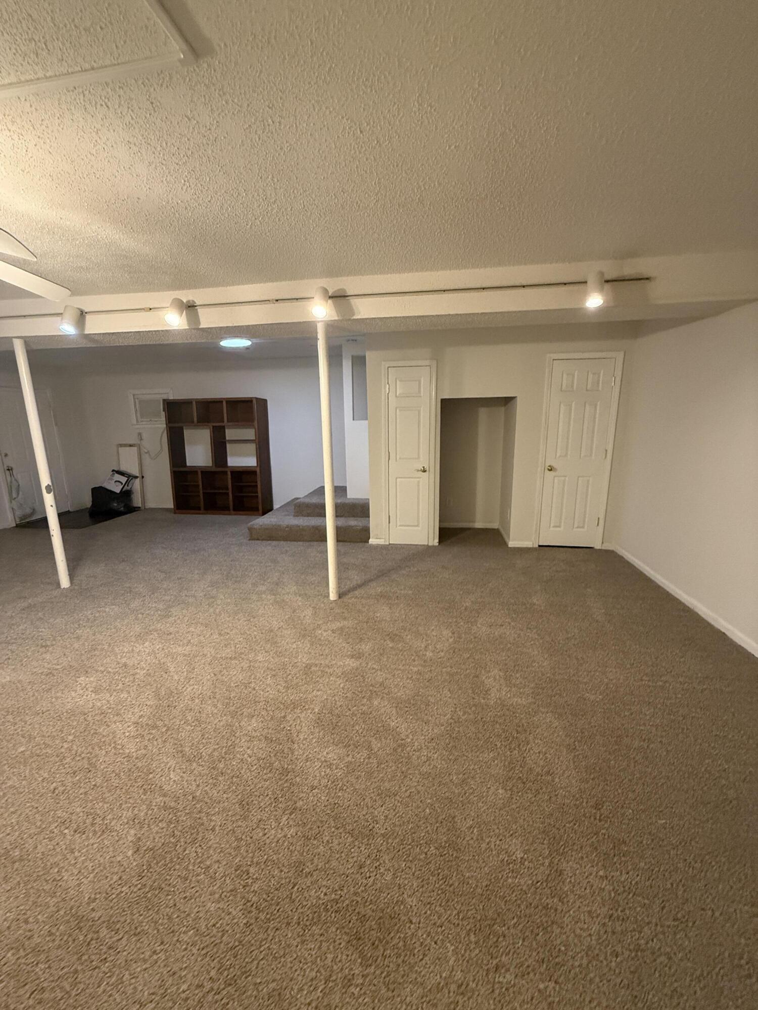 504 Main Street Destin, FL 32541 - Photo 7 of 25 an empty room with windows