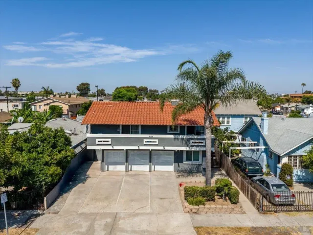 a view of a swimming pool with a patio