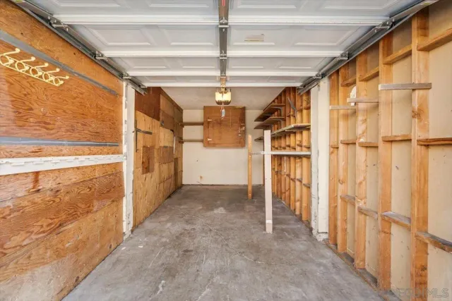 a view of empty room with an entryway