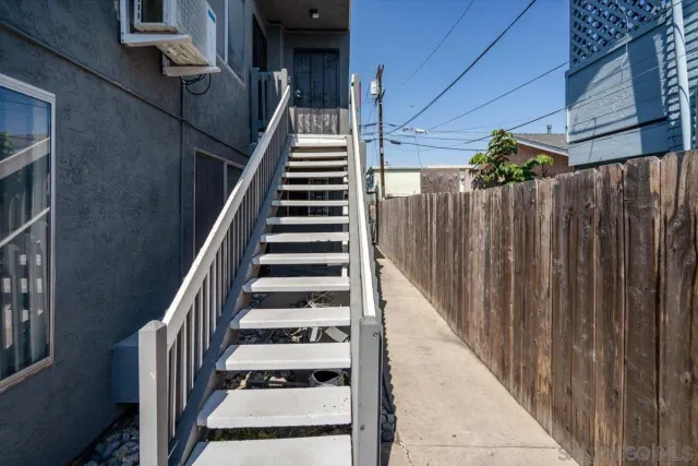 a view of entryway with wooden floor