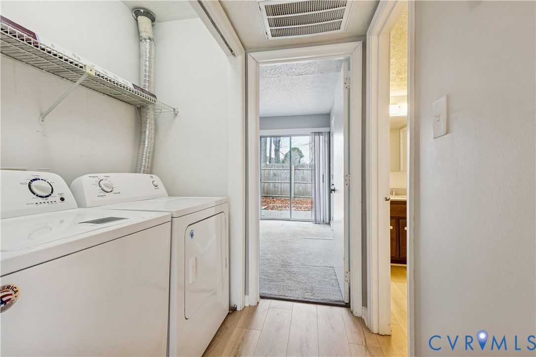377 Kinsmen Way Hampton, VA 23666 - Photo 11 of 30 a utility room with dryer and washer