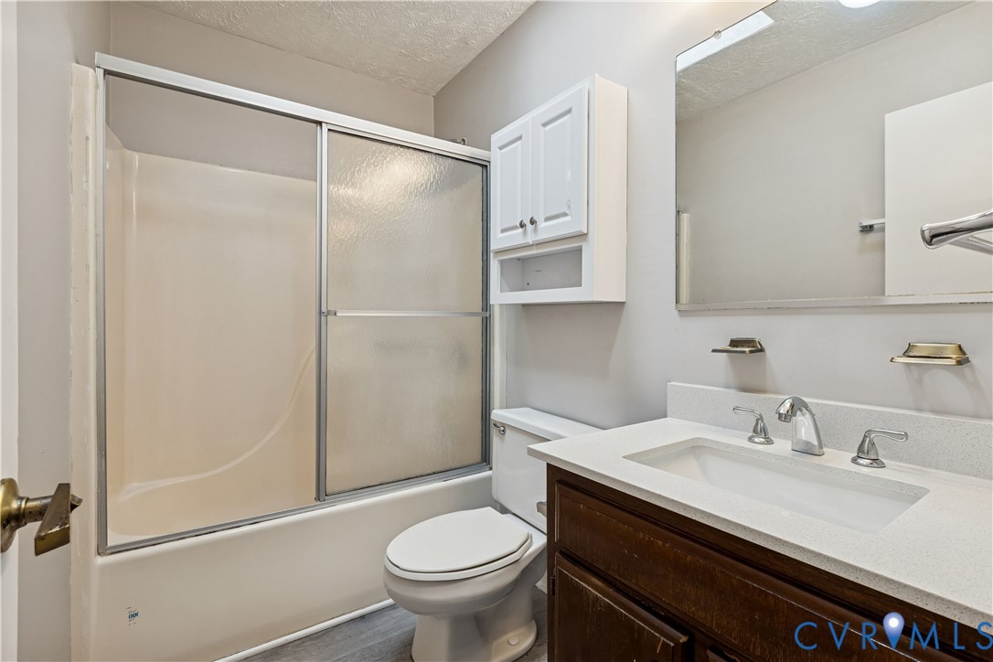 377 Kinsmen Way Hampton, VA 23666 - Photo 20 of 30 a bathroom with a sink toilet and shower