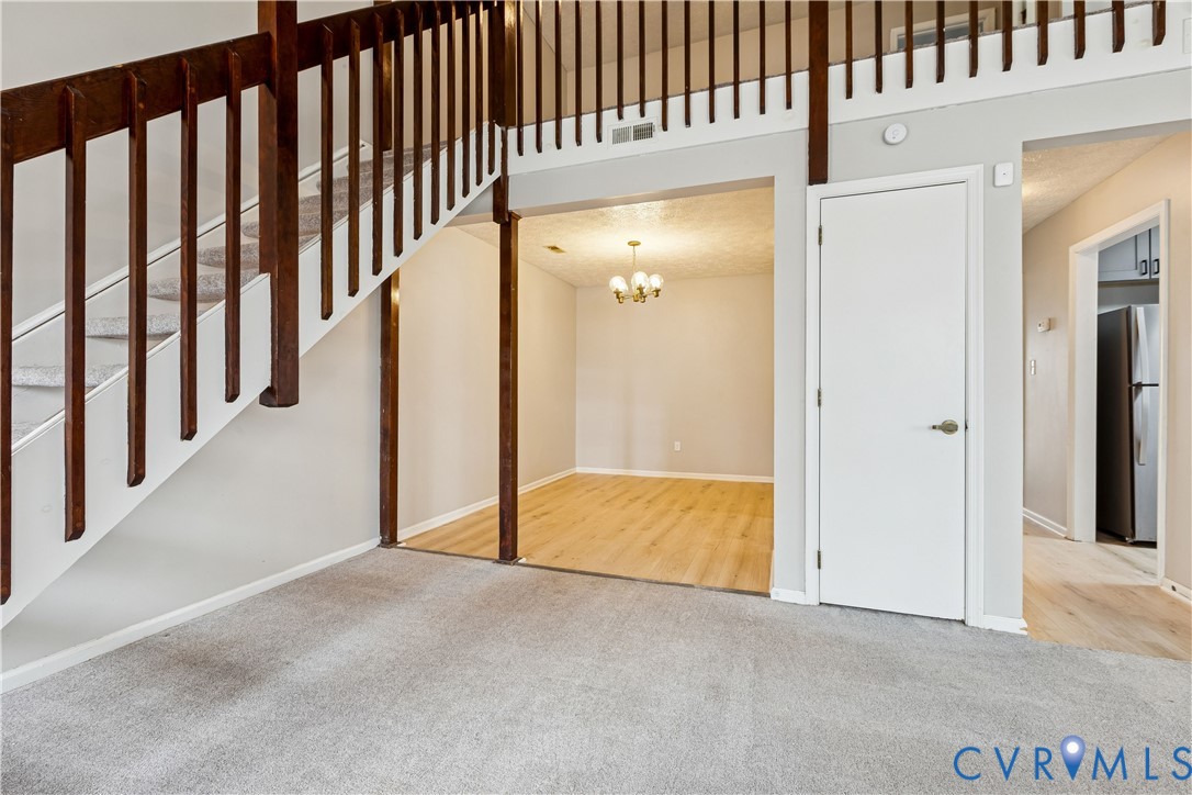 377 Kinsmen Way Hampton, VA 23666 - Photo 6 of 30 a view of an empty room with wooden floor