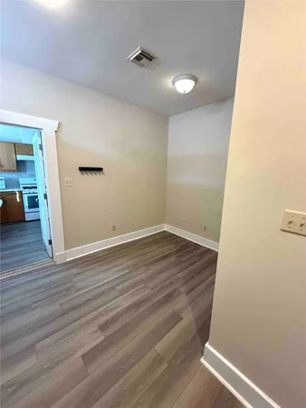 a view of livingroom with wooden floor