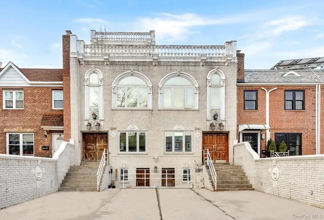 a front view of a house with a outdoor space