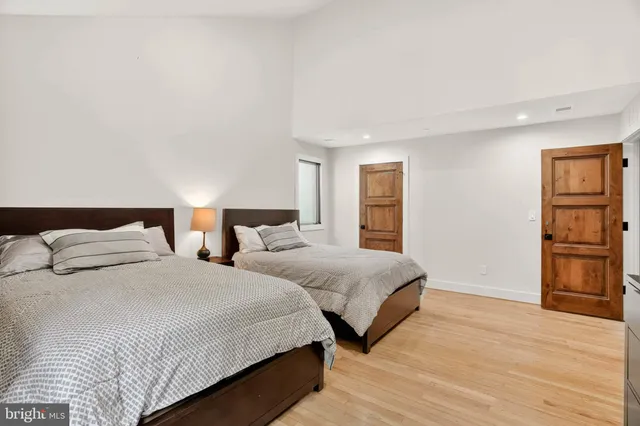 an aerial view of a residential houses with city view and lake view