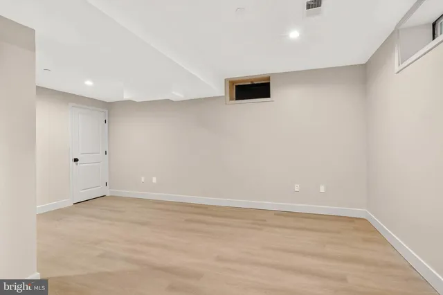 a view of a swimming pool with a yard