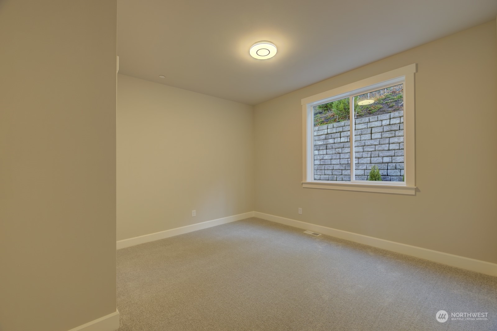 20210 94th Drive Northeast Bothell, WA 98011 - Photo 11 of 30 an empty room with a window