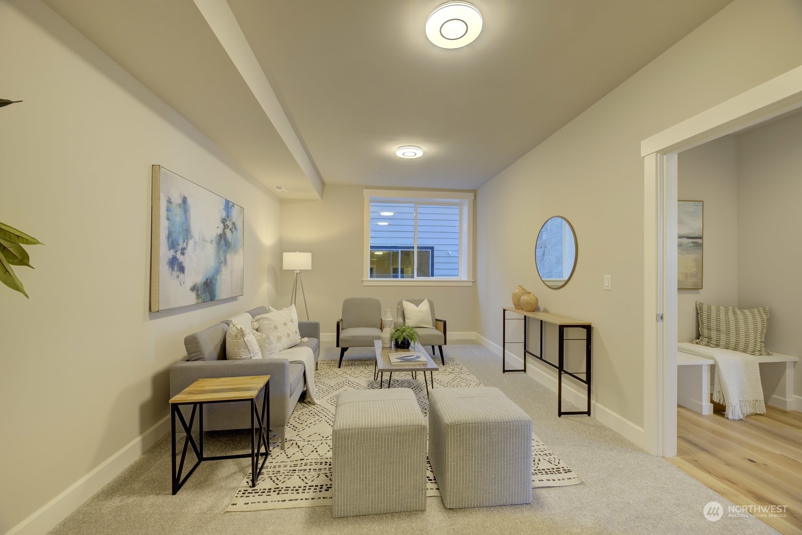 20210 94th Drive Northeast Bothell, WA 98011 - Photo 13 of 30 a living room with furniture a rug and a large window