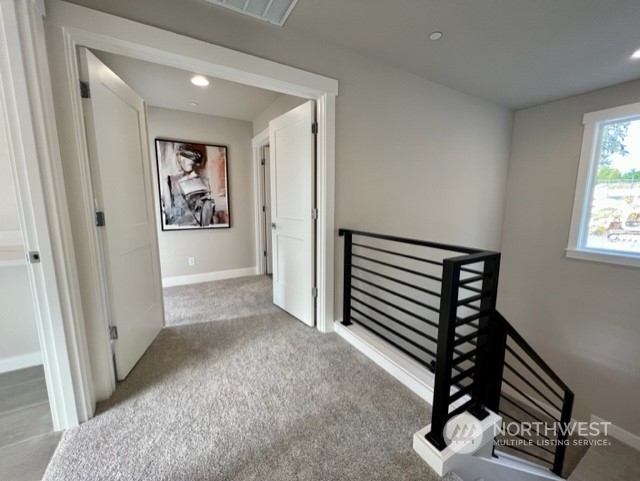 20210 94th Drive Northeast Bothell, WA 98011 - Photo 15 of 30 a view of a hallway with wooden floor and a window