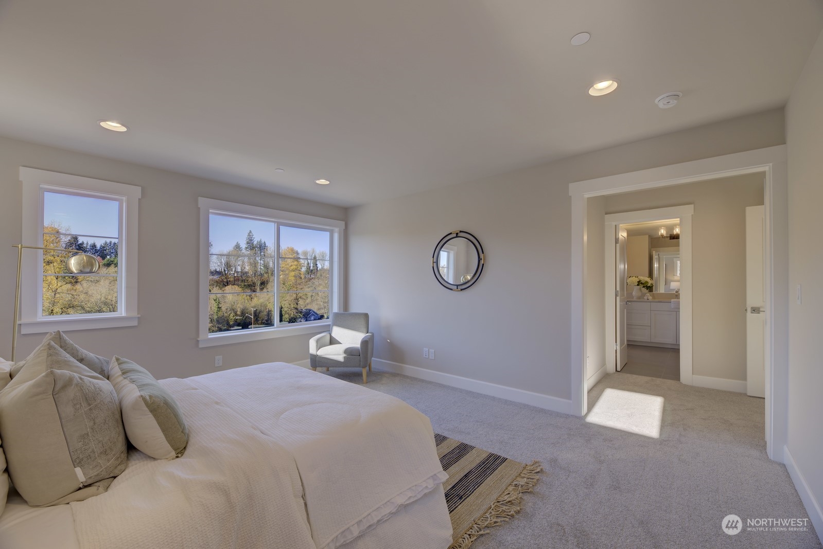 20210 94th Drive Northeast Bothell, WA 98011 - Photo 17 of 30 a bed room with a bed and painting on the wall