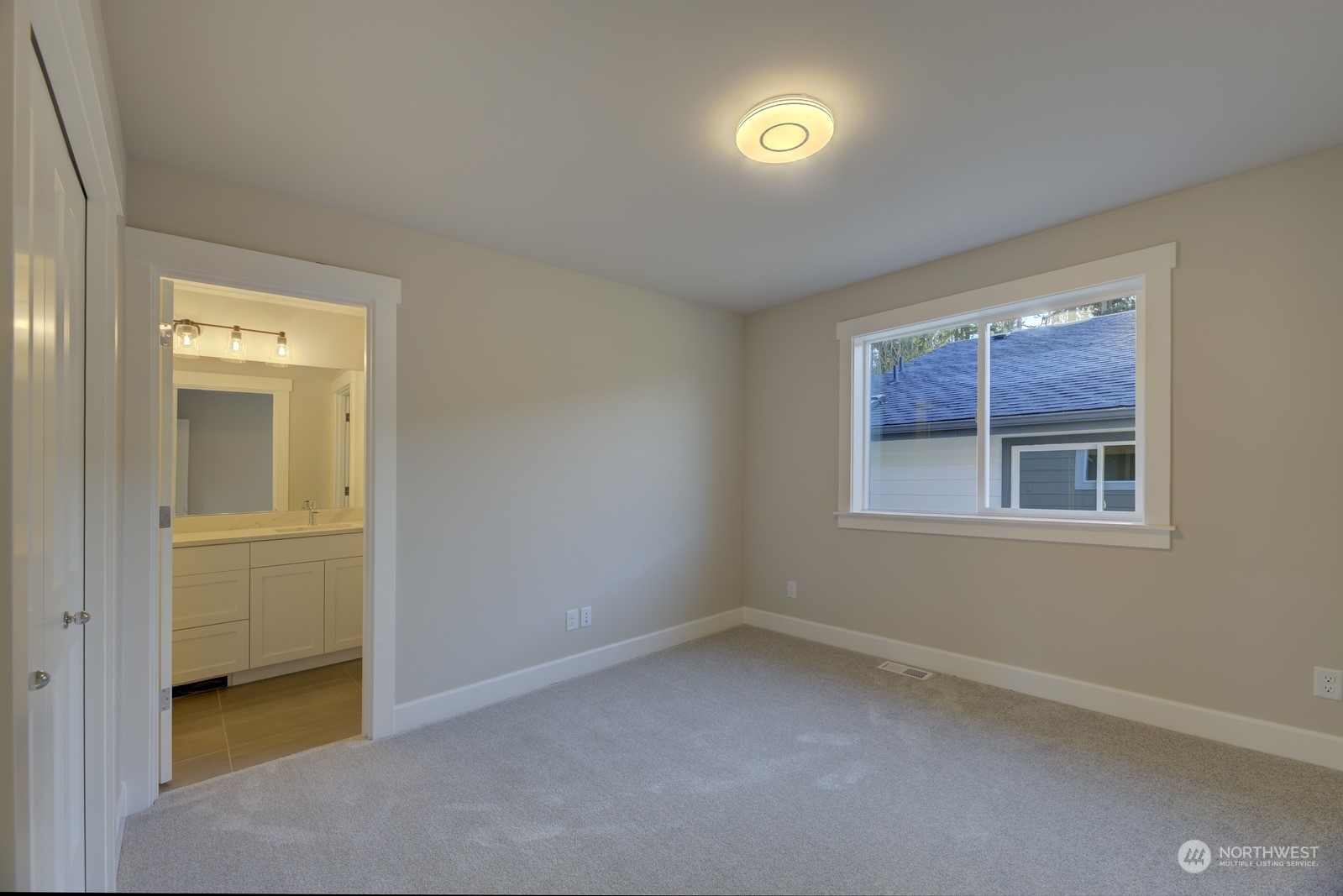 20210 94th Drive Northeast Bothell, WA 98011 - Photo 21 of 30 an empty room with windows and closet