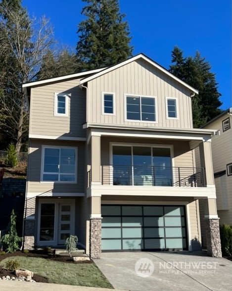 20210 94th Drive Northeast Bothell, WA 98011 - Photo 25 of 30 a front view of a house with garden