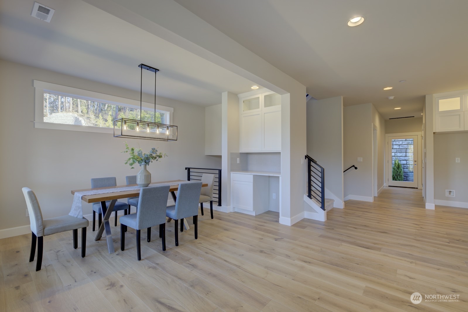 20210 94th Drive Northeast Bothell, WA 98011 - Photo 5 of 30 a view of a dining room with furniture and wooden floor