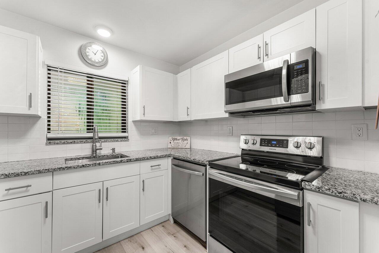 5300 Nesting Way, Unit A Delray Beach, FL 33484 - Photo 8 of 53 Kitchen