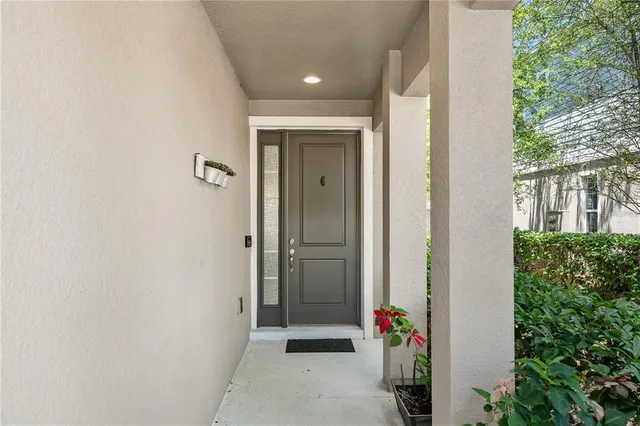 a kitchen with stainless steel appliances granite countertop a sink and a stove