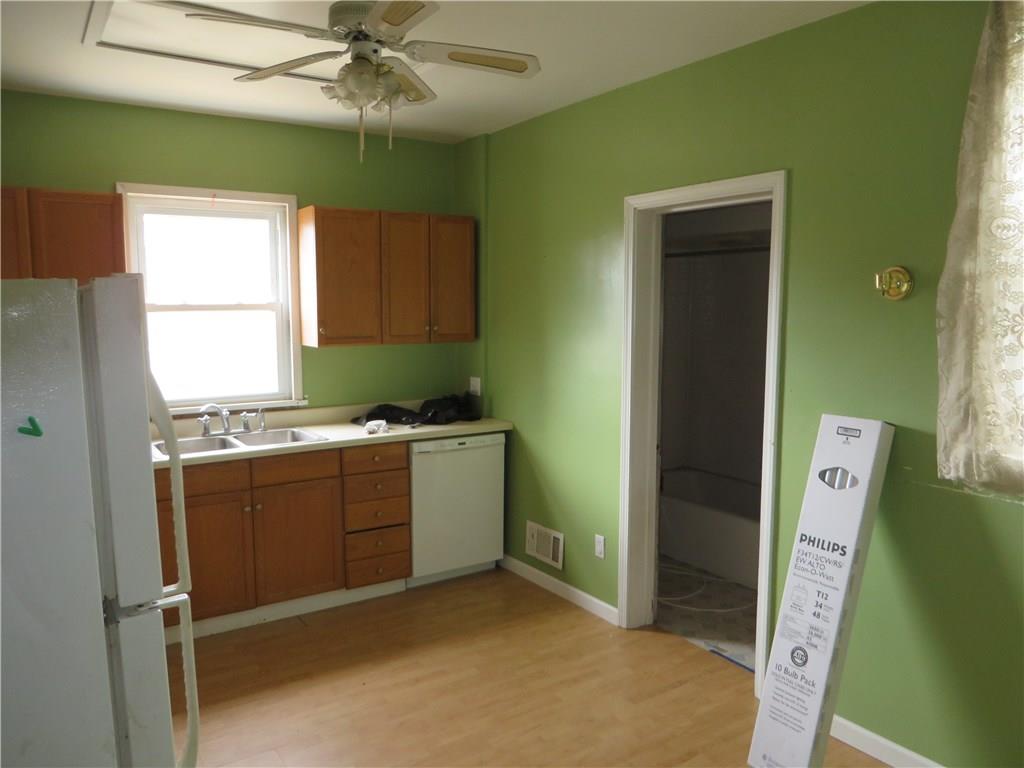 325 Evergreen Road Pittsburgh, PA 15209 - Photo 3 of 25 Large kitchen with full bath attached