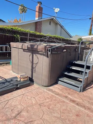 a view of a backyard with wooden roof