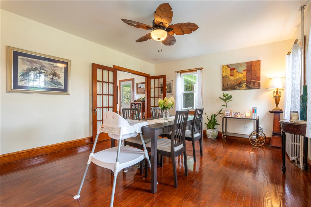 665 Point Phillips Road Bath, PA 18014 - Photo 16 of 73 Rich hardwood floors complement french doors leading to an inviting dining area, ideal for entertaining.