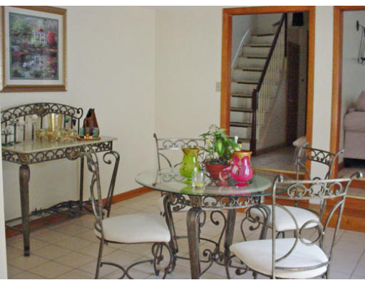 73 Spring Street Cambridge, MA 02141 - Photo 1 of 1 a view of a dining room with furniture and wooden floor