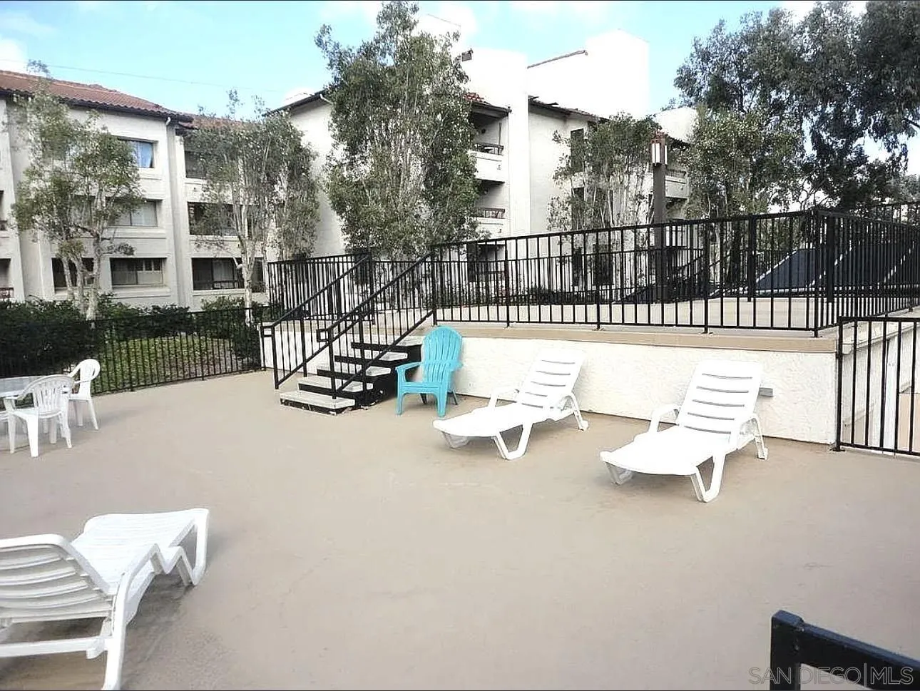 5645 Friars Road, Unit 397 San Diego, CA 92110 - Photo 11 of 22 a view of a patio with two chairs and a couch