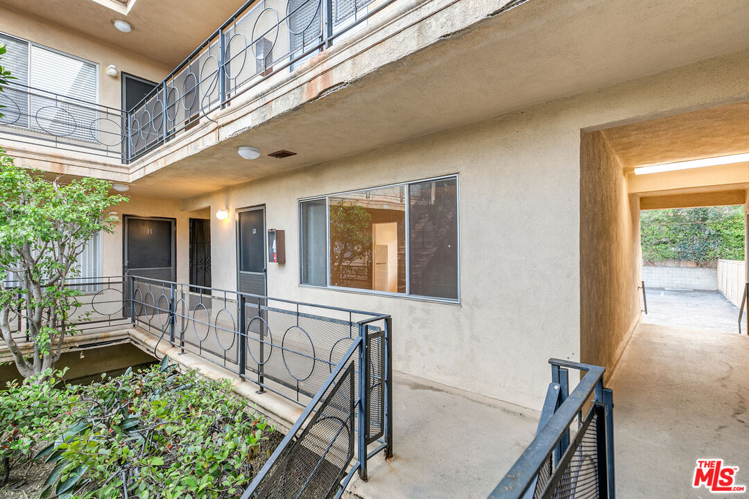 2637 South Centinela Avenue, Unit 13 Santa Monica, CA 90405 - Photo 1 of 15 a view of an entryway with a balcony