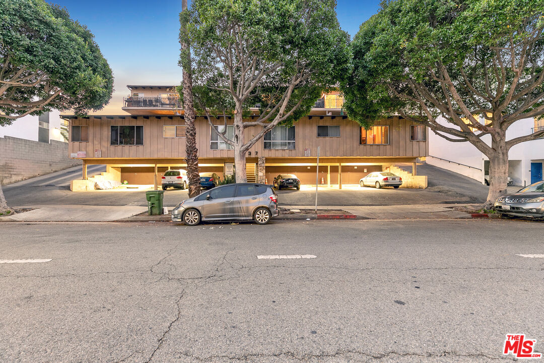 2637 South Centinela Avenue, Unit 13 Santa Monica, CA 90405 - Photo 14 of 15 a view of a city street with a parked car
