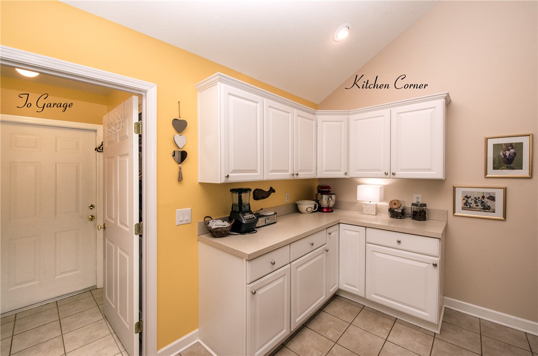 113 Life Style Lane Anderson, SC 29621 - Photo 14 of 28 This bright kitchen corner features ample cabinetry, a generous countertop, and convenient garage access.