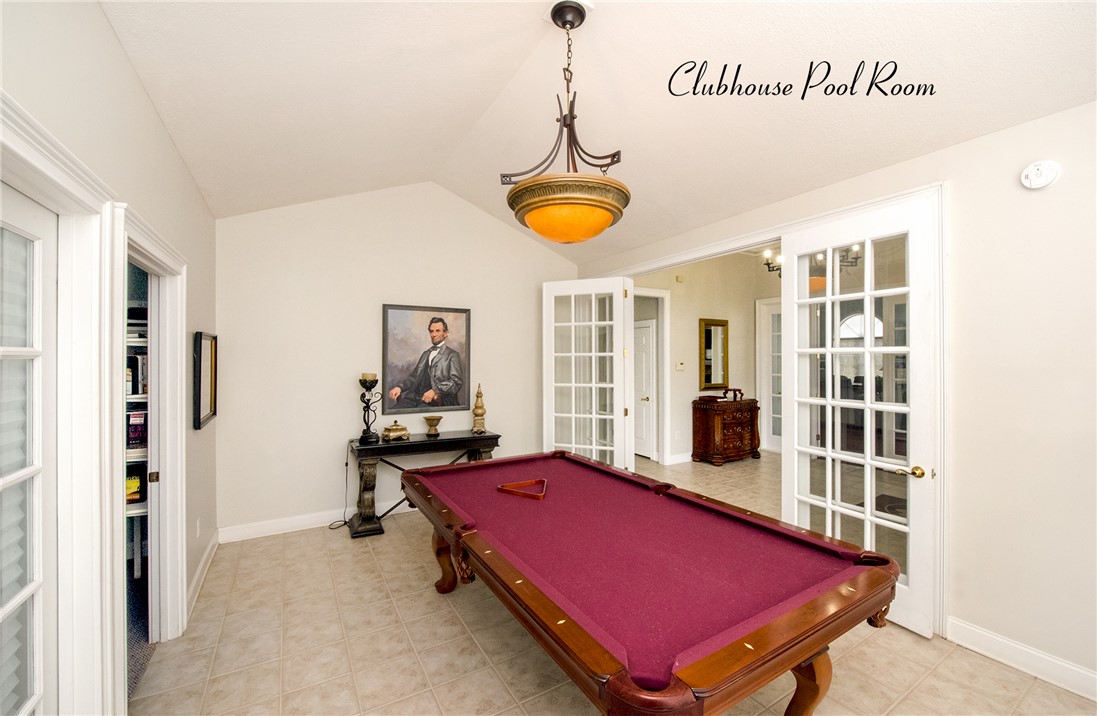 113 Life Style Lane Anderson, SC 29621 - Photo 25 of 28 This inviting game room, featuring vaulted ceilings and elegant French doors, offers a sophisticated space for leisure.